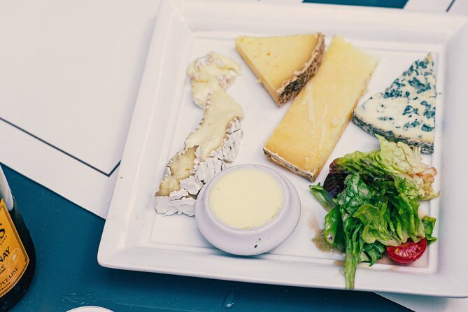 A Morning in Paris Food Tour: Croissants, Baguettes & Chocolate - Cheese and fruit jelly: the stop that turns snacks into a meal