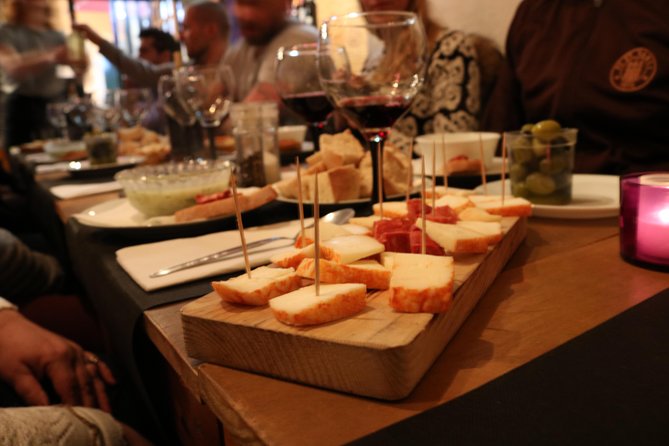 A True Taste of Lisbon: Portuguese Tapas, Wine & Surprise Drink - Key highlights worth showing up for