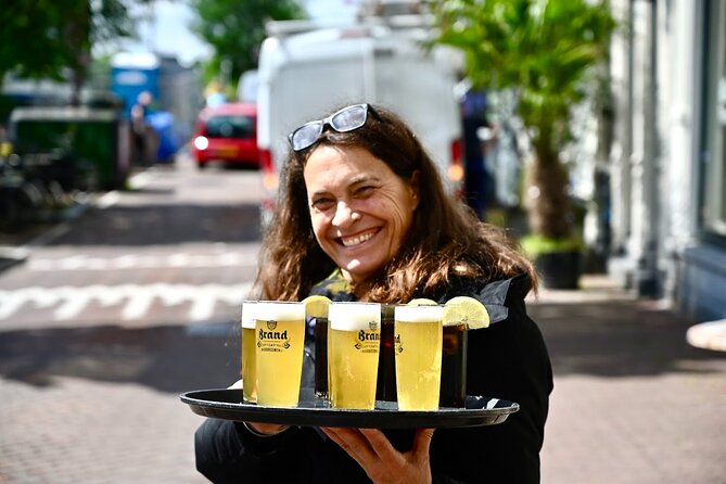 Amsterdam Food Tour of 10+ Local Classic Tastings in Jordaan Area - From Westermarkt to Westertoren: Landmarks That Match the Food Mood