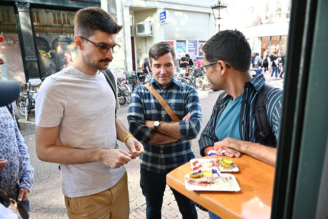 Amsterdam Food Tour with Full Meal & Drinks by Do Eat Better - Bloemenmarkt cheese tasting: flowers and dairy in the same breath