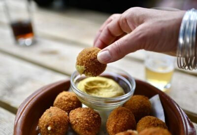 Amsterdam: Jordaan Food Tour of 10+ Local Classic Tastings - The Dutch Cheese and Deli Stop: Where Familiar Flavors Get Interesting