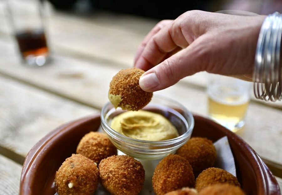 Amsterdam: Jordaan Food Tour of 10+ Local Classic Tastings - The Dutch Cheese and Deli Stop: Where Familiar Flavors Get Interesting