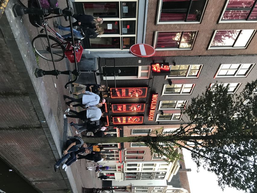 Amsterdam: Private Red Light District and Food Tour - Coffee shop culture: learning the rules without the moral panic