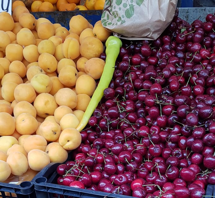 Athens: Traditional Greek food tour in hidden spots - Olive stalls and a much-loved deli: the snack section that feels like Athens
