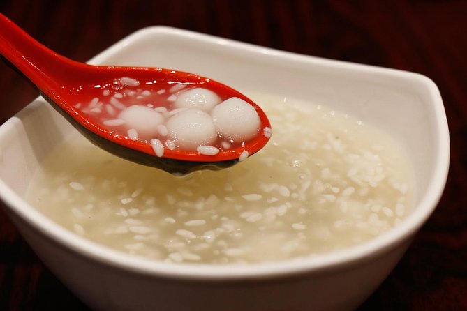 Authentic Local Food Tour in Central Shanghai - Stop 1 in Xintiandi: Soup Dumplings as a Lesson in Texture