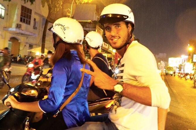Award-winning Saigon Food Tour with GirlPower Drivers | KissTour - Scooters, helmets, and the reality of evening traffic