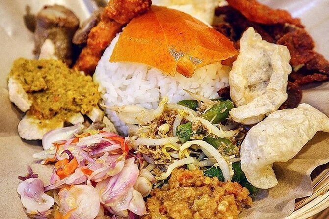 Bali Street Food Tour - Stop 1: Bajra Sandhi Monument sets the context before the eating