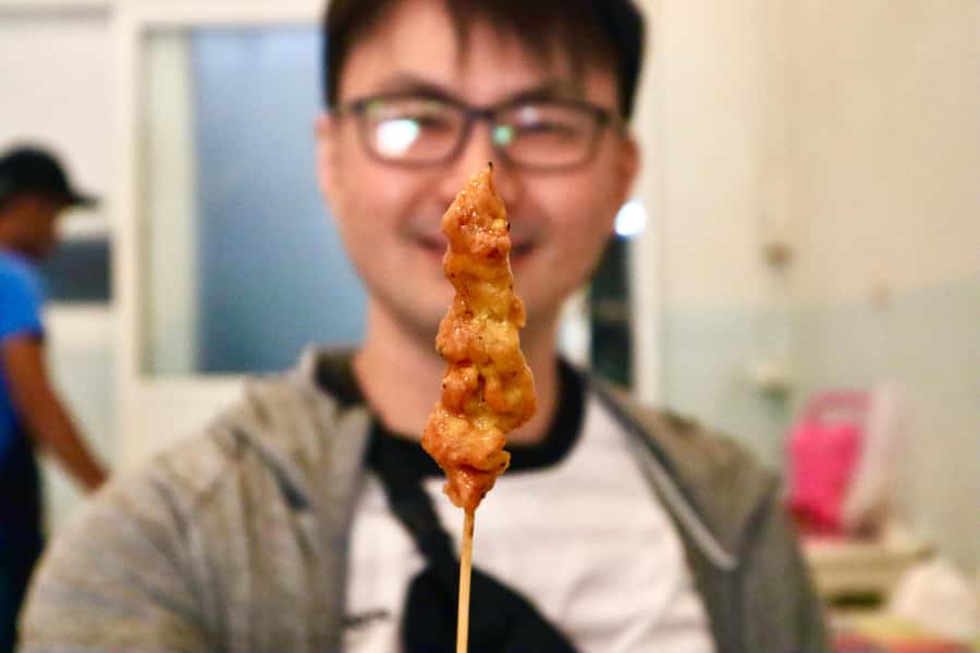 Bangkok: Chinatown Street Food Tour with 8+ Local Dishes - Stop 2: Spicy grilled pork, sticky rice, and local beer