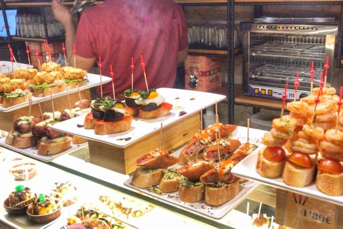 Barcelona Food Tour: Market & Gothic Quarter with Expert Guide - Gothic Quarter: pinchos, bravas, and the why behind the streets