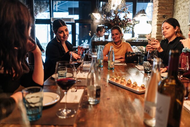 Barcelona: Guided Food Walking Tour with Tapas and Wine - Where to start: Plaça de Correus and the yellow flag rule