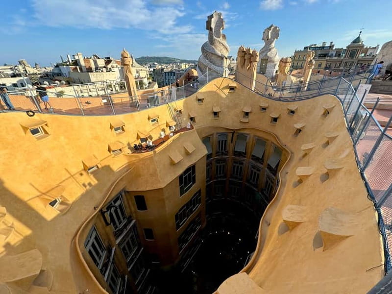 Barcelona: Sagrada Familia, La Pedrera & Cava Tasting Tour - The rooftop walk: chimneys, skylights, and city views