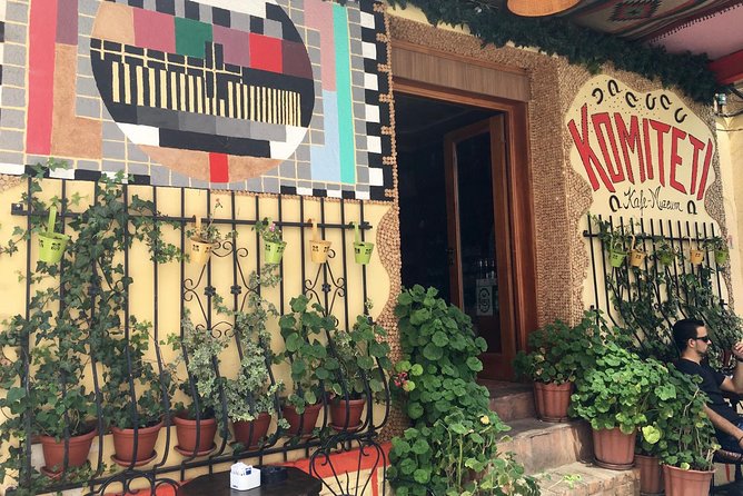 Best of Local Food & City Tour of Tirana - Food & Drinks Included - Deshmoret e Kombit and Pallati i Kongreseve: architecture first, then lunch