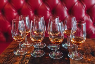 Beyond the Barrel: NuLu Walking Bourbon & Food Pairing Experience - Stop 1: The Last Refuge and Church of Bourbon Energy
