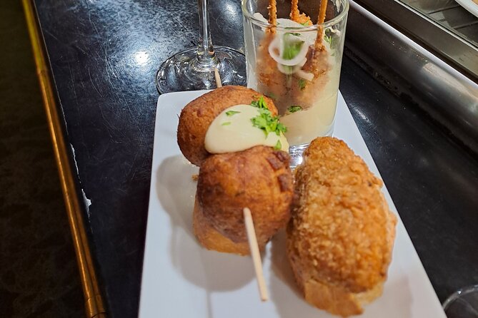 Bilbao Food Tour: Pintxos, Drinks, and Tapas with a Local - Erribera Kalea finale: a taberna by the shore