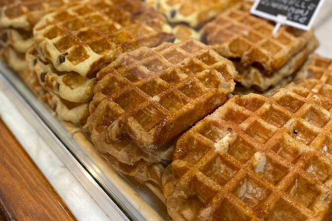 Brussels Food Tour: 10 Tastings of Waffles, Beers, Fries & More - Meeting at Auguste Orts statue and getting your bearings fast
