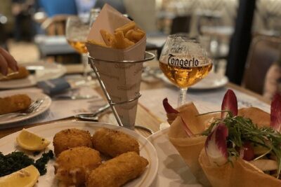 Brussels Food Tour: 10 Tastings of Waffles, Beers, Fries & More - Herman Van Dender and the Grand Place chocolate story chain