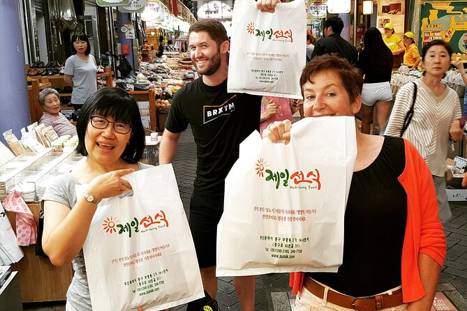 Busan history and market food tour with local chef - BIFF Square and hotteok: the street-food stop that resets your appetite