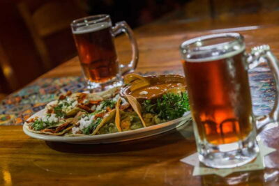 Cancún: Taco & Local Beer Tasting Tour with transportation - Stop-by-stop taco route: five tastings, three restaurants, one night venue