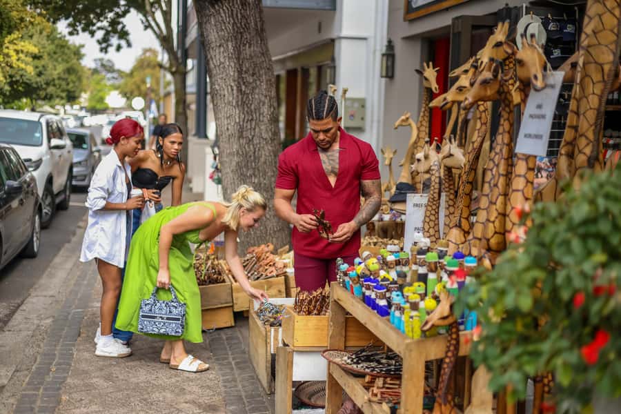 Cape Town: Full-Day Wine Tasting Tour with Wine Tram - Franschhoek: Gourmet Town Energy Between Tastings