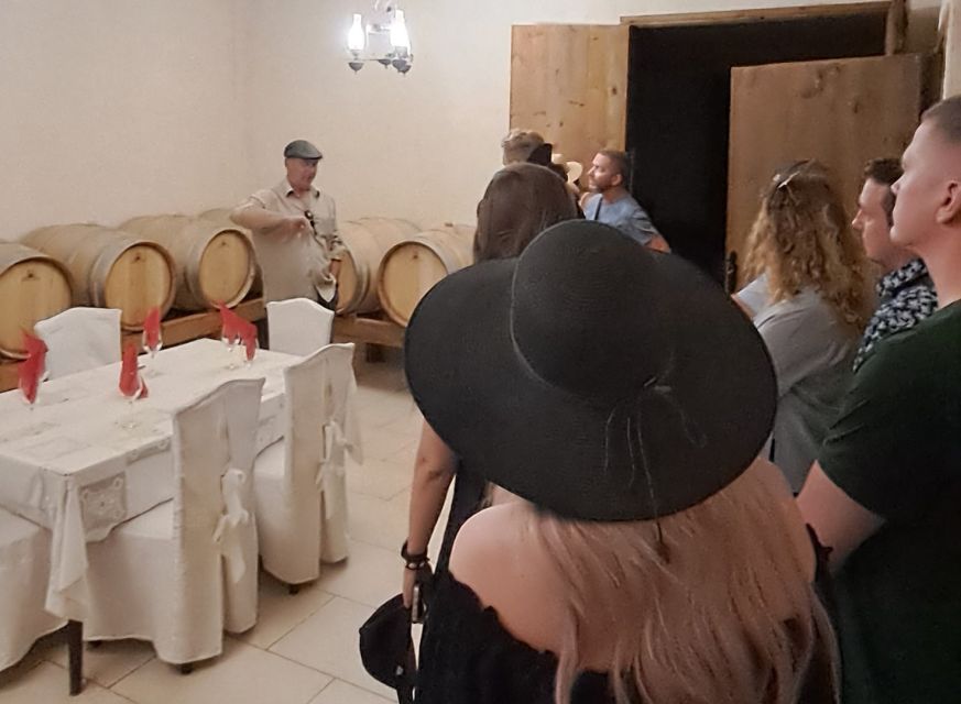 Crete: Full-Day Cretan Wines, Olive Oil, Raki and Food Tour - Raki distillery with an ancient wine press: why the day turns boozy