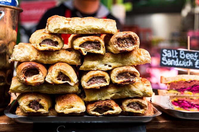 Devour London: Borough Market & Leadenhall Food Tour with Wine - Borough Market tastings: sausage roll, sweet shops, and the modern take on tradition