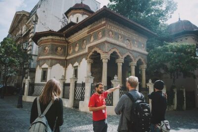 Discover Bucharest: Private Highlights and Traditional Food Tour - Revolution Square and the Carol I Statue: More Than a Postcard