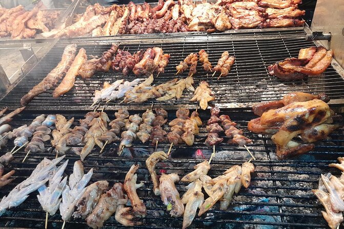 Evening Cambodian Food Tour - Stop 3: Chaktomuk Conference Hall and the insect, spider, and bug tasting