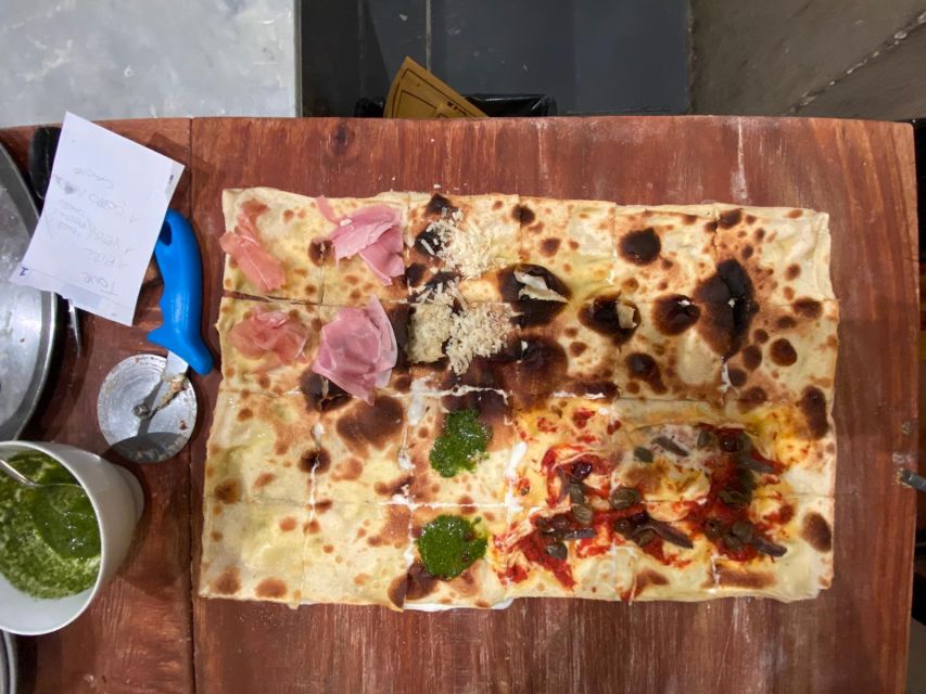 Genoa: The Ultimate Traditional Food and Drinks Tour - Genoa’s caruggi are made for food stops
