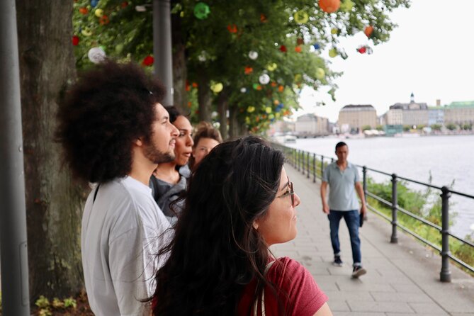 Hamburg Walking Food Tour with 7 Authentic Local Dishes - Binnenalster lake views and an on-the-go Hamburger to take in Town Hall canals