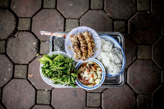Hanoi Street Food Tour By Motorbike + Sightseeing SAFE & FUN - Safety and comfort on a Honda scooter (helmet, poncho, and pacing)