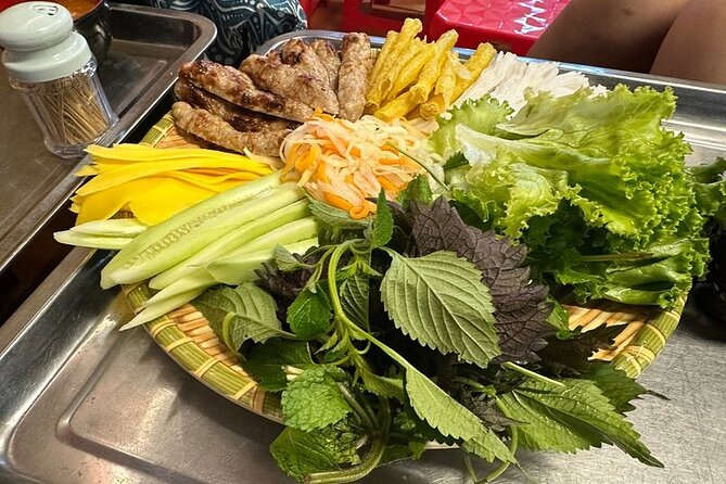 Hanoi Walking Street Food Tour with Train Street - Duờng Tau inside access: waiting for the train like it’s the main course