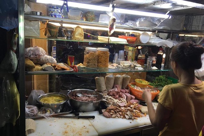 Ho Chi Minh City: Street Food Walking Tour with 12 Tastings - How the Scooter Hops Work (and Why the Helmet Matters)
