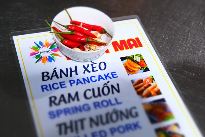Hoi An Vespa Food Tour: Authentic & Exotic Food Culture - Stop 1 in Hoi An Center: A Quick Orientation Before You Eat