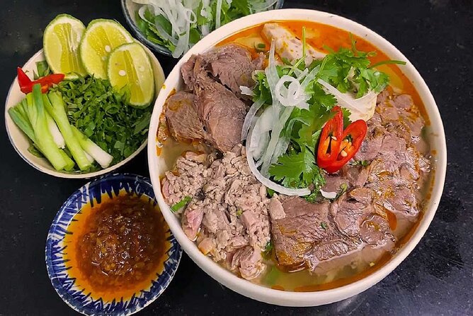 Hue Food Tour by Walking or Cyclo or Motorbike with Driver - Perfume River (Nhu Y branch) and Han Mac Tu Street: finishing with local-only favorites