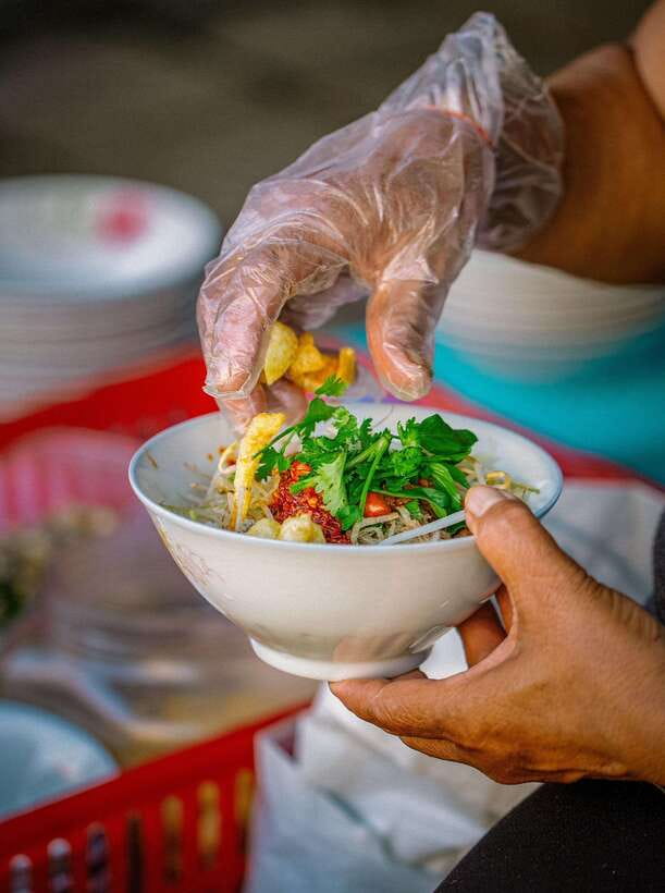 Hue: Guided Local Food Tour with Stories - Hue at night, tasted street-by-street