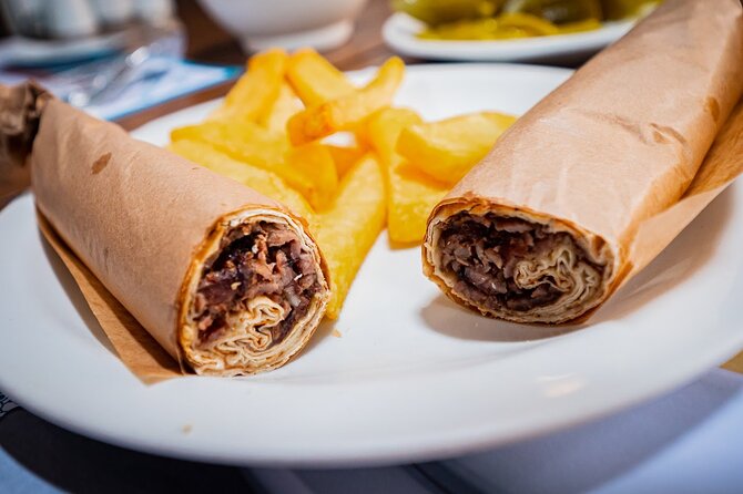 Istanbul Kadikoy Food Tour with 12+ Local Delicacies Tastings - Stop 1 on Doktor Esat Işık Caddesi: Turkish breakfast and tea