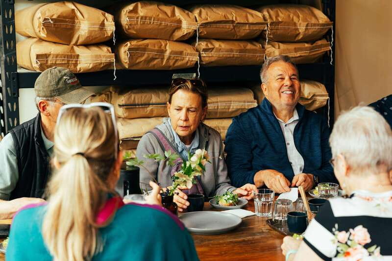 Kelowna: Walking Food Tour with 7 Tastings and 4 Drinks - Laurel Packinghouse: the red-brick start and Andrew’s Okanagan stories