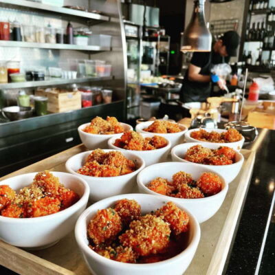 Kelowna: Walking Food Tour with 7 Tastings and 4 Drinks - Waterfront Park tastings and boardwalk time on Okanagan Lake
