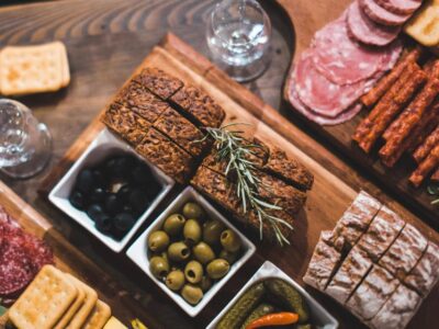 Krakow: Vodka Tasting Tour: Tapas, Tipsy Tales & Hidden Gems - Tapas and first pours at the starting bar
