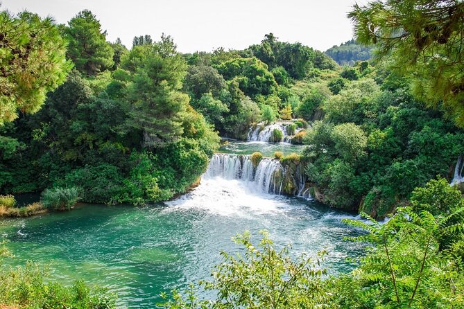 Krka Waterfalls and wine tasting Tour from Split or Trogir - Roški slap: Your Best Chance to Swim (and Why You Shouldn’t Chase Waterfall Swimming)