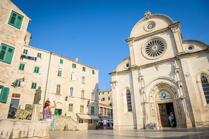 Krka Waterfalls and wine tasting Tour from Split or Trogir - Canyon Panoramas, Visovac Island Views, and the Coastal Return