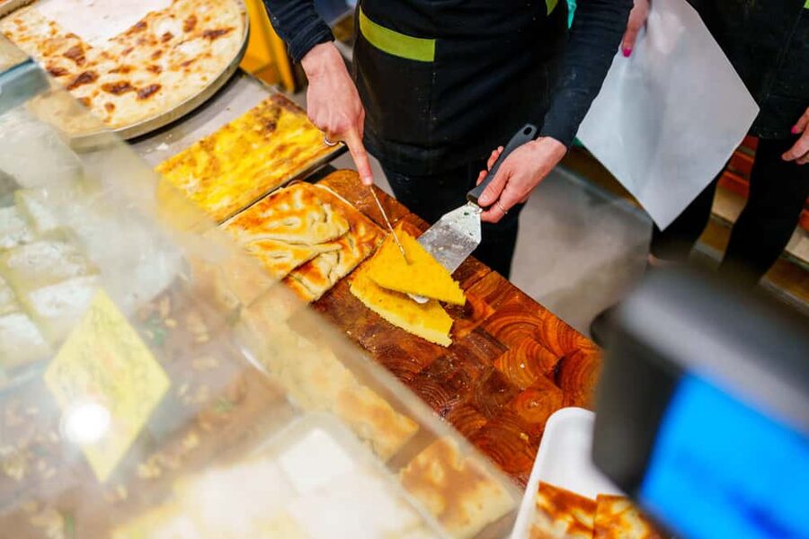 La Spezia: Taste Cinque Terre on a Full Meal Food Tour - The first street-food stops: sgabei and mesciua type of comfort