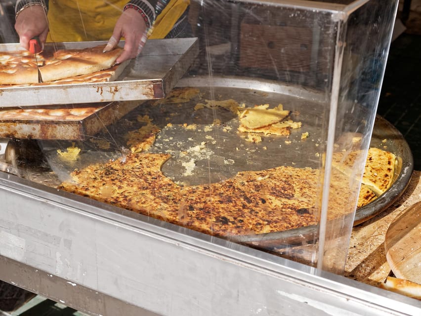 La Spezia: Taste Cinque Terre on a Full Meal Food Tour - Lunch centerpiece: testaroli or panigacci with pesto-style flavors