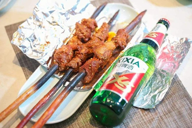 Late Night Food Tour in the Shanghai's French Concession - Stop 1: Xintiandi street tastes and the history your guide points out