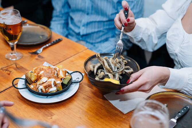 Lisbon: Award-Winning Guided Walking Food Tour with Local Drinks - Stop 3 (Rua da Vitória): Grilled Sardines and Vinho Verde Snap-Crisp Pairing