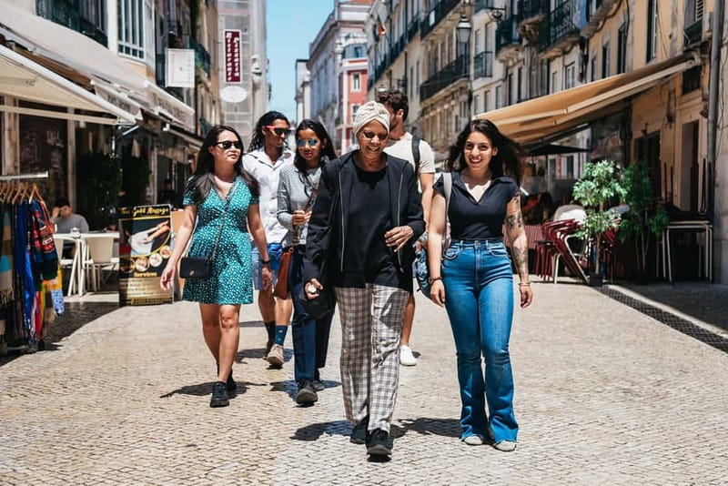 Lisbon: Baixa District Food Tour with Dinner and Drinks - Petiscos and drinks: ginjinha, vinho verde, and 4 included pours