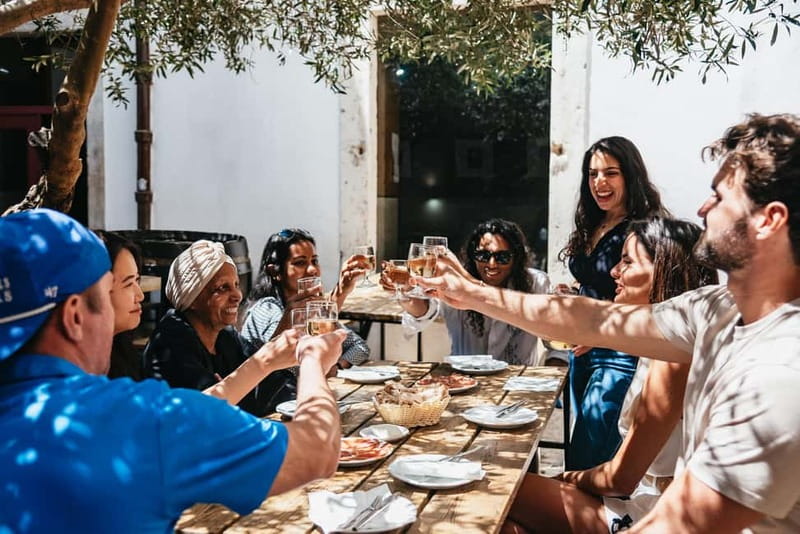 Lisbon: Baixa District Food Tour with Dinner and Drinks - The landmarks add context: why the squares matter on a food tour