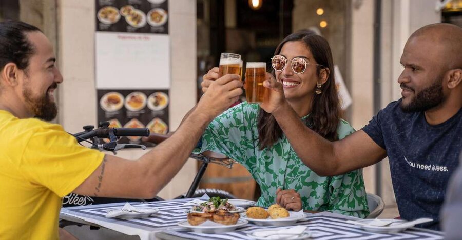 Lisbon: E-Bike Food Tour of Alfama and Old Town - Commerce Square to Alfama: Getting Oriented Before You Start Eating