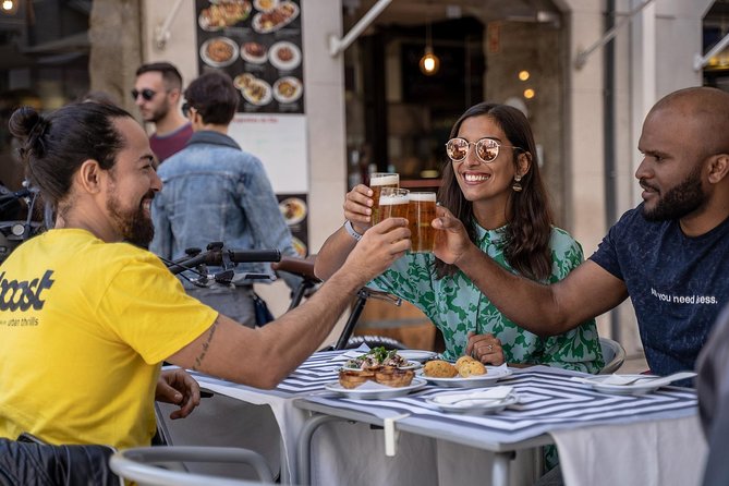 Lisbon E-Bike Guided Food Tour with Five Food Tastings - Pedaling into Alfama’s medieval lanes and Santo António energy