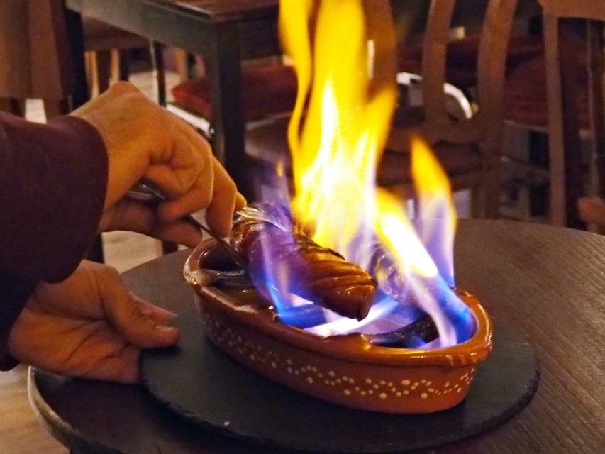 Lisbon: Evening Local Food Crawl with Drink Pairings - The cheese and wine moment you’ll actually remember (and reuse)
